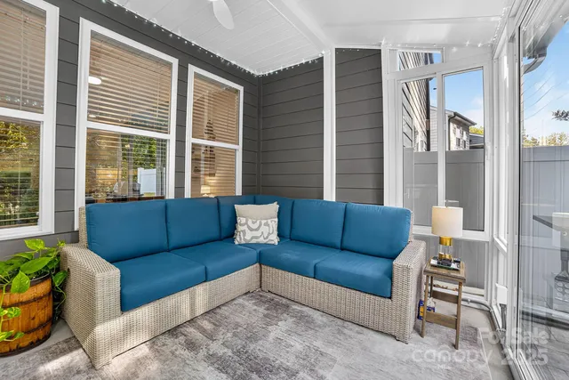 a view of a garden with a bench in patio