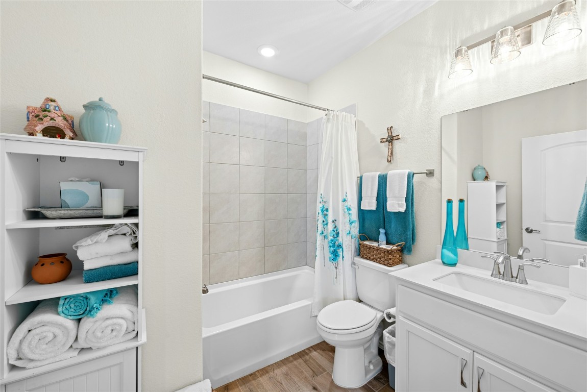 104 Coachsmith Street Georgetown, TX 78633 - Photo 22 of 38 a bathroom with a sink a toilet and shower