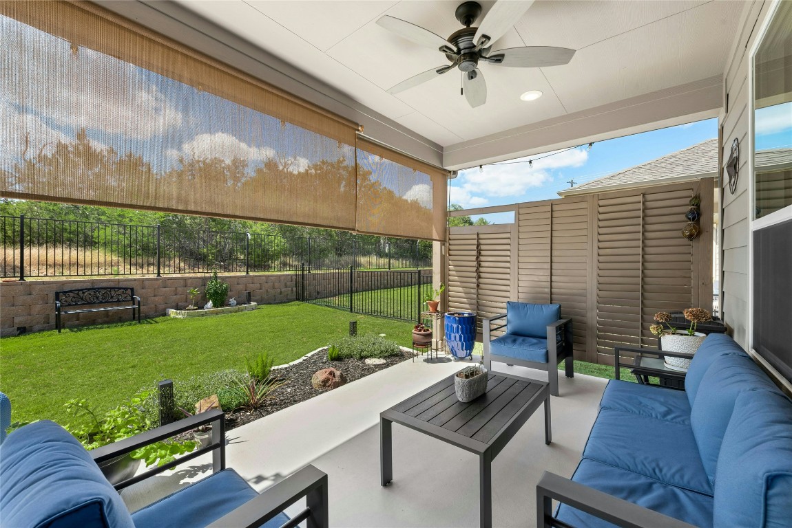 104 Coachsmith Street Georgetown, TX 78633 - Photo 27 of 38 a living room with furniture and a yard