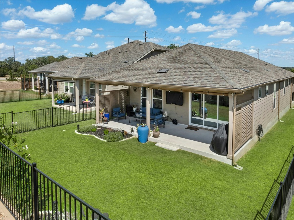 104 Coachsmith Street Georgetown, TX 78633 - Photo 30 of 38 a view of a house with backyard and porch
