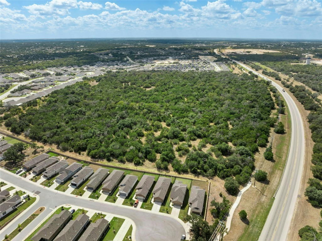 104 Coachsmith Street Georgetown, TX 78633 - Photo 31 of 38 a view of a lake from a balcony