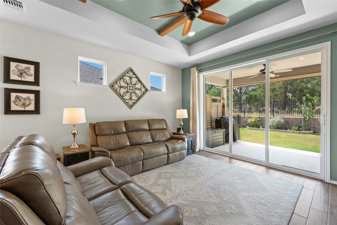 104 Coachsmith Street Georgetown, TX 78633 - Photo 5 of 38 a living room with furniture and a large window