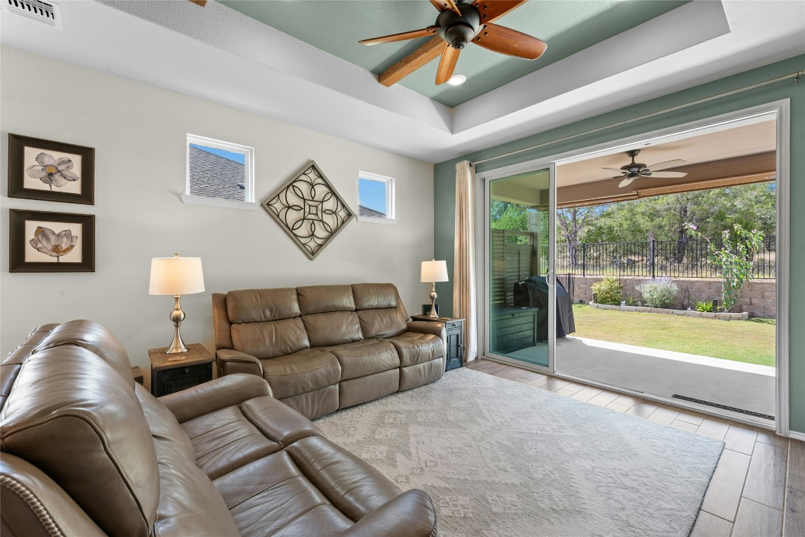 104 Coachsmith Street Georgetown, TX 78633 - Photo 6 of 38 a living room with furniture and a large window