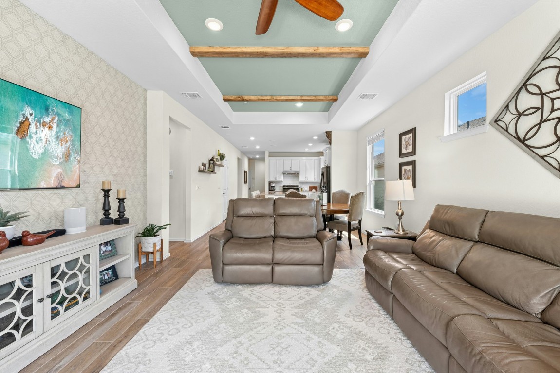 104 Coachsmith Street Georgetown, TX 78633 - Photo 7 of 38 a living room with furniture and wooden floor