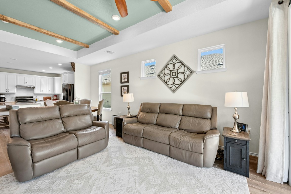 104 Coachsmith Street Georgetown, TX 78633 - Photo 8 of 38 a living room with furniture and a couch
