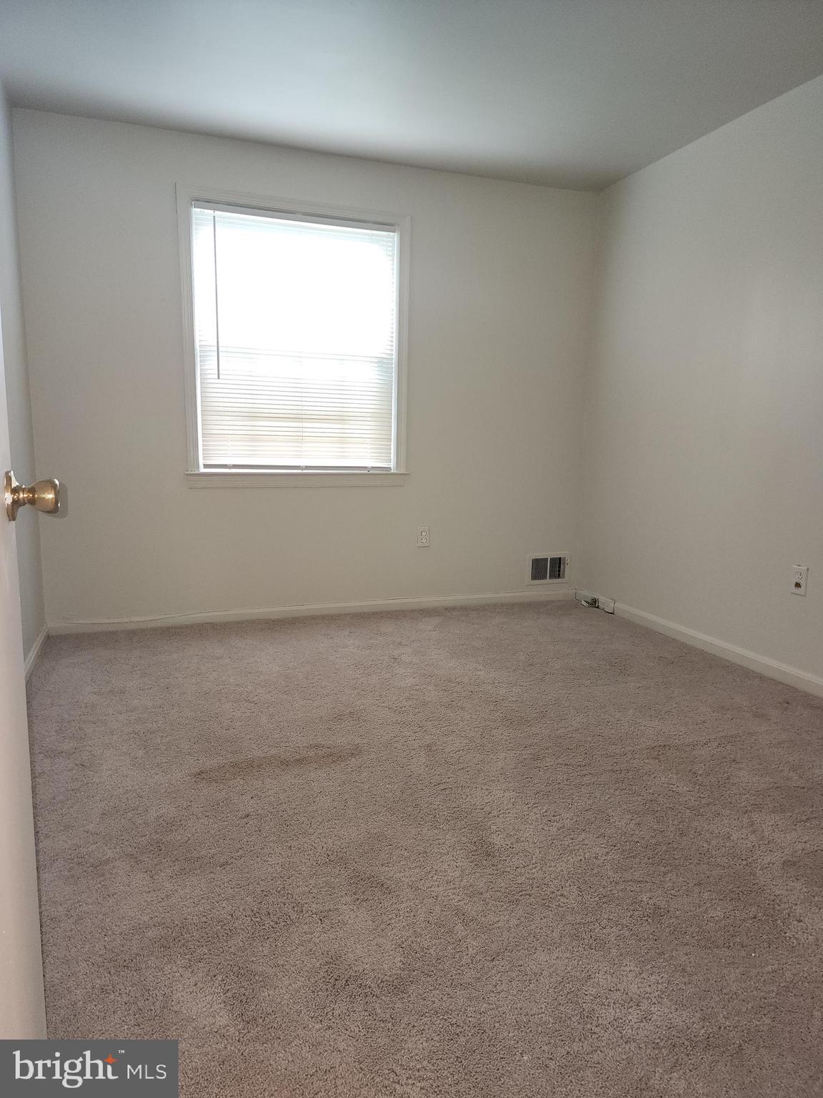1270 Palmer Road, Unit 92 Fort Washington, MD 20744 - Photo 13 of 24 an empty room with a window