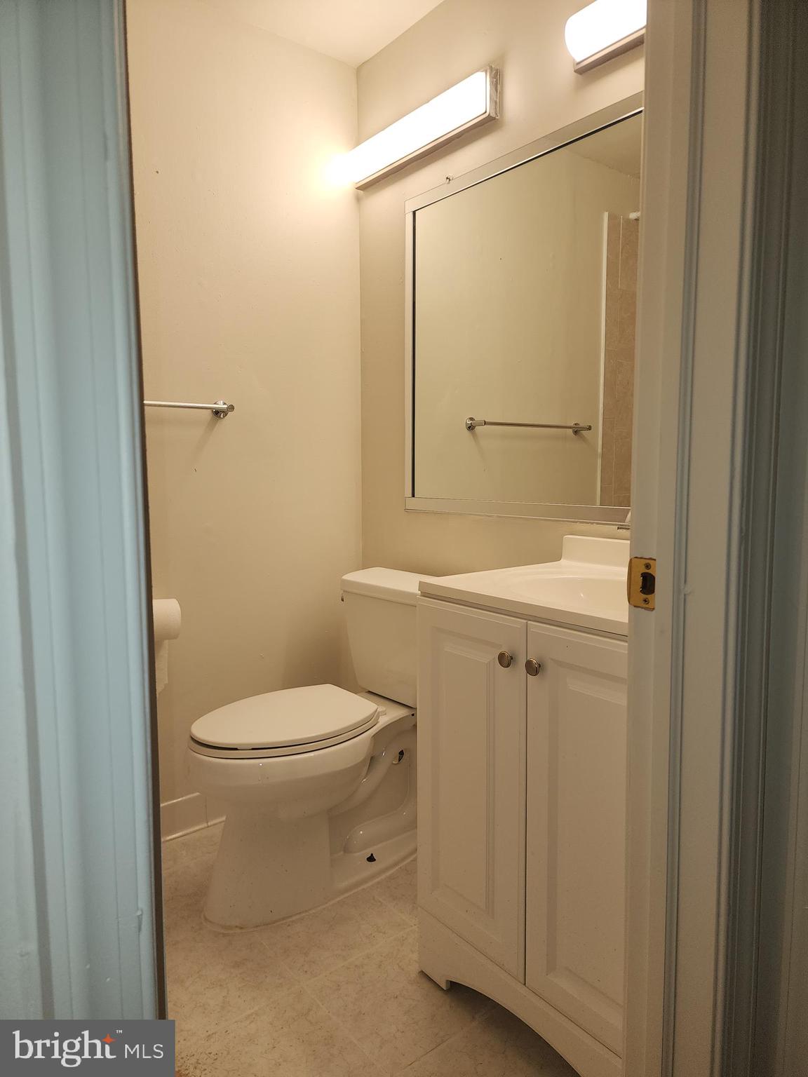 1270 Palmer Road, Unit 92 Fort Washington, MD 20744 - Photo 15 of 24 a bathroom with a toilet a sink and shower