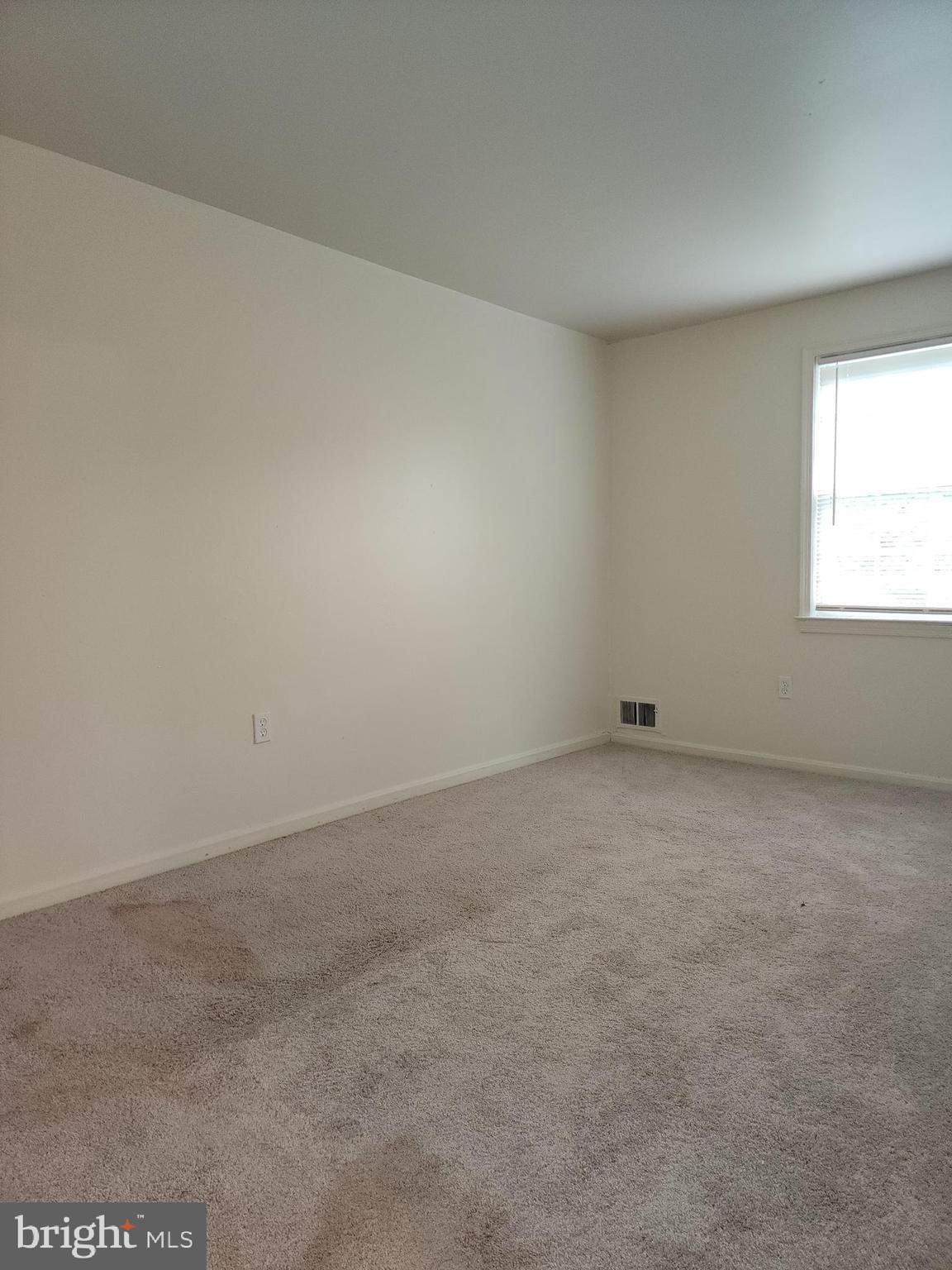 1270 Palmer Road, Unit 92 Fort Washington, MD 20744 - Photo 17 of 24 an empty room with a window