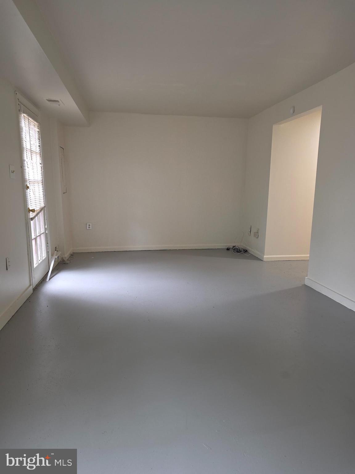 1270 Palmer Road, Unit 92 Fort Washington, MD 20744 - Photo 22 of 24 an empty room with windows