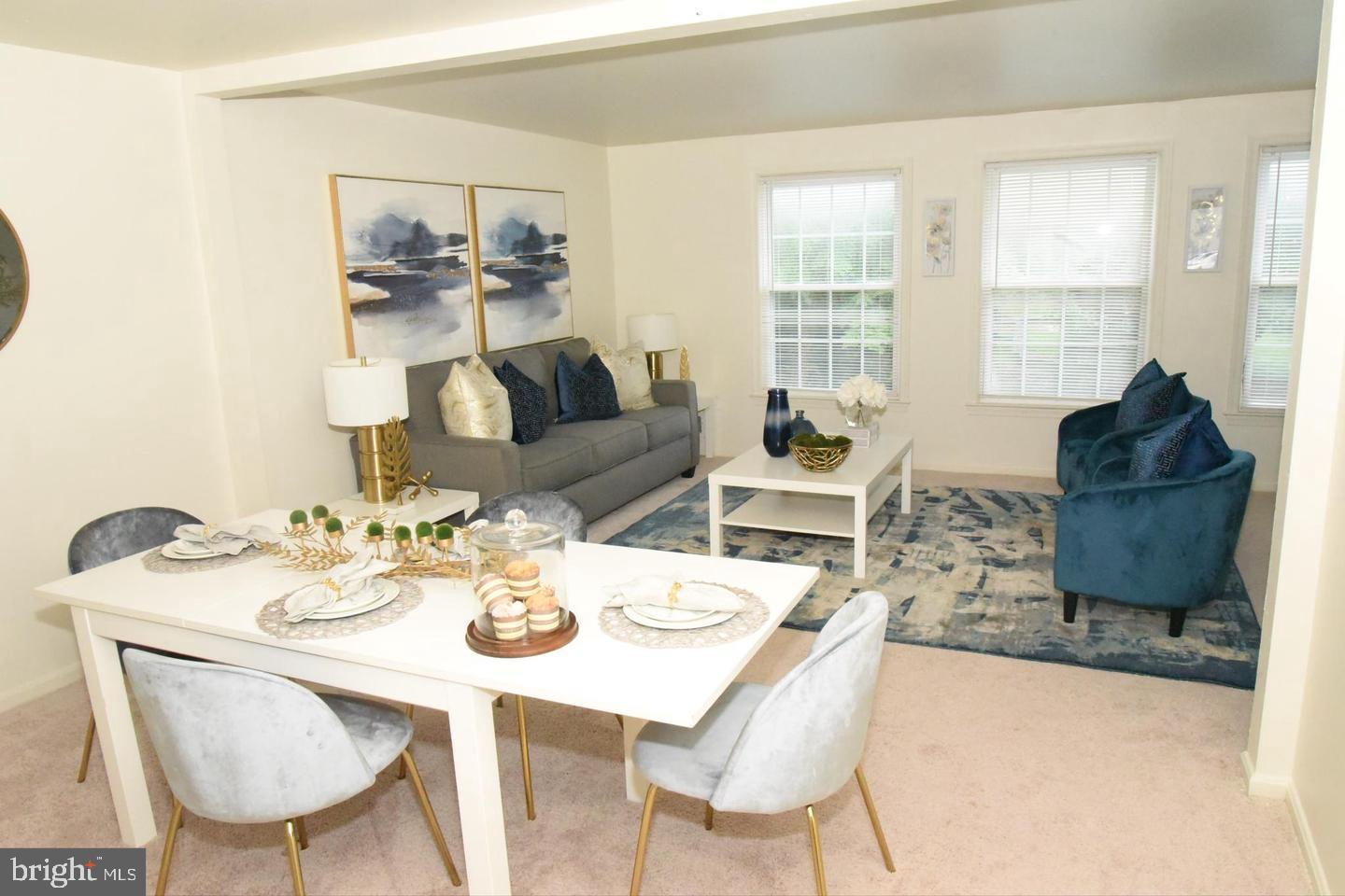 1270 Palmer Road, Unit 92 Fort Washington, MD 20744 - Photo 4 of 24 a living room with furniture and a flat screen tv