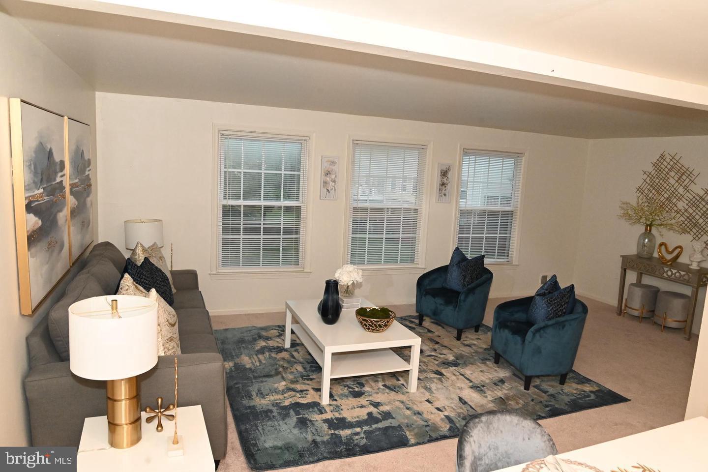 1270 Palmer Road, Unit 92 Fort Washington, MD 20744 - Photo 6 of 24 a living room with furniture