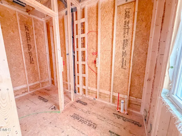 a view of an empty room with a balcony