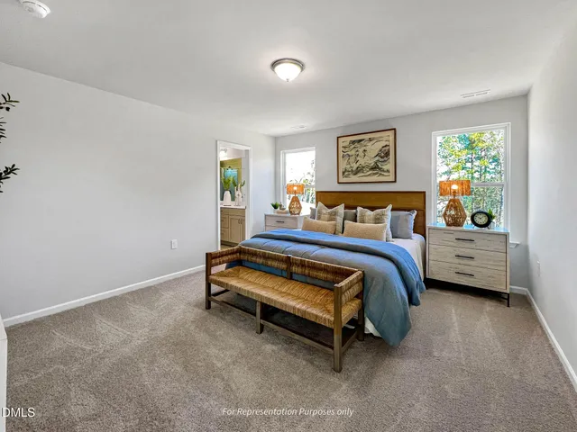 a bathroom with a double vanity sink and mirror