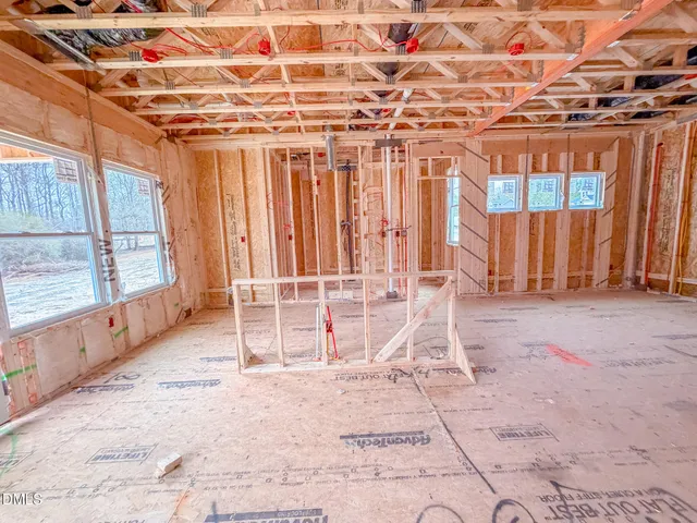 a view of a room with wooden walls