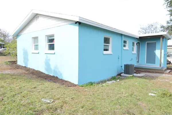 a view of a backyard of a house