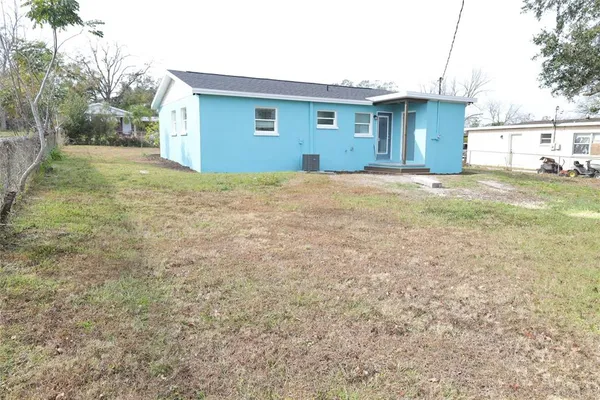 a view of backyard of house