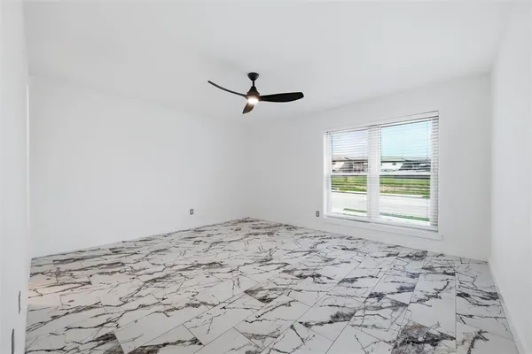 a view of a window in an empty room