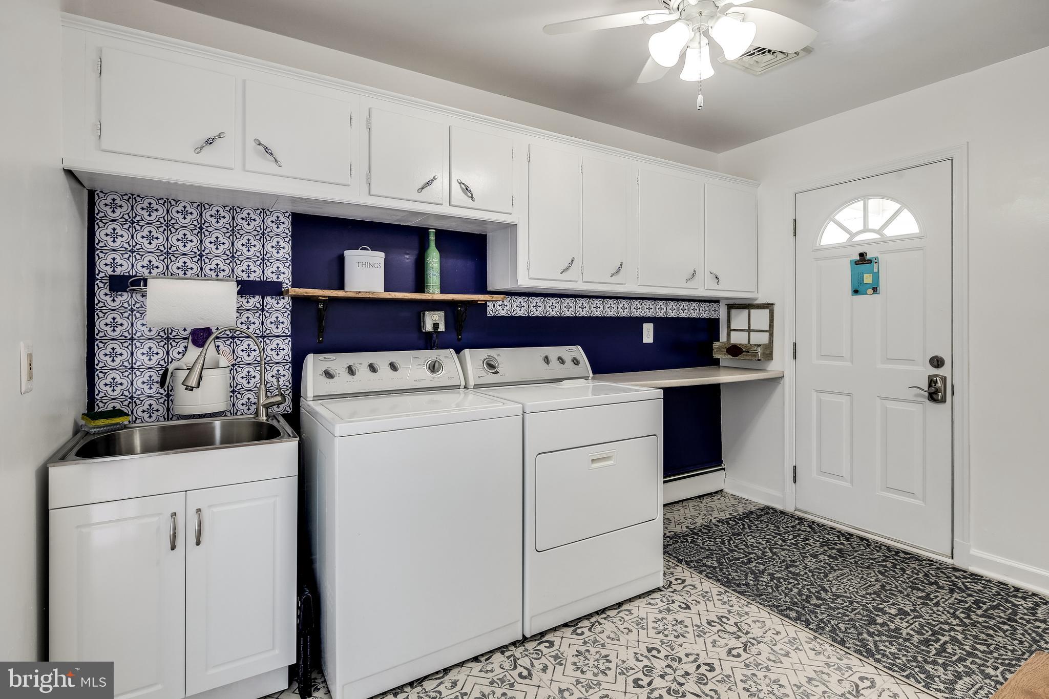 22720 Woodfield Road Gaithersburg, MD 20882 - Photo 7 of 39 Laundry/mudroom directly off kitchen.