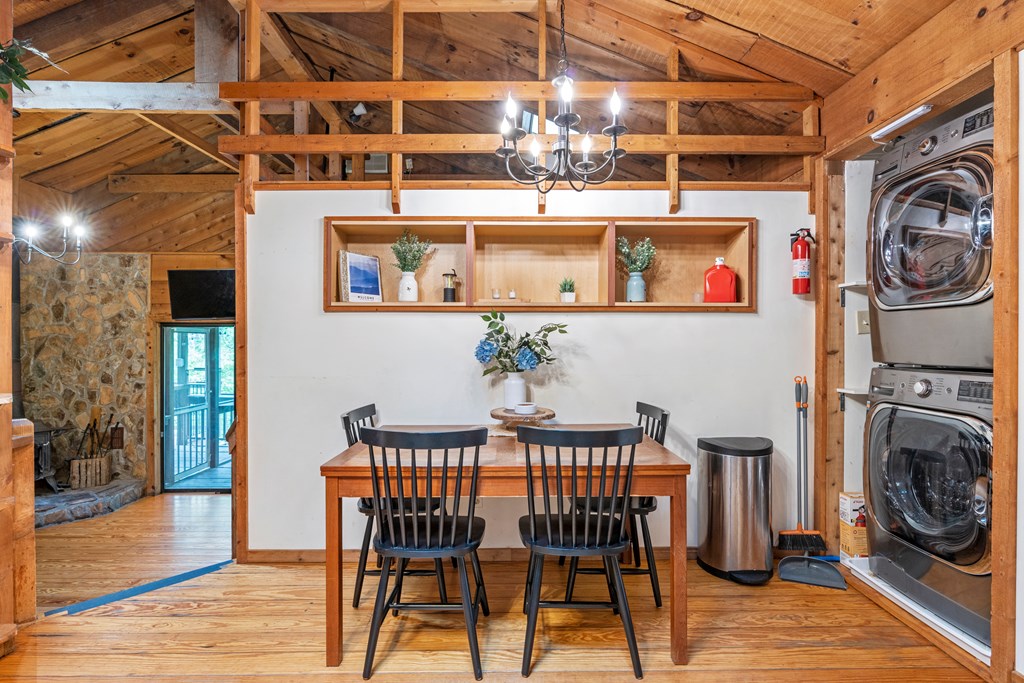 87 Rustic Ridge Road Blue Ridge, GA 30513 - Photo 15 of 23 a view of a dining room with furniture and wooden floor