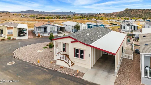 aerial view of a house with a ocean view