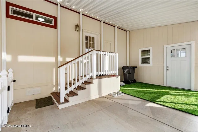 a view of an entryway with staircase