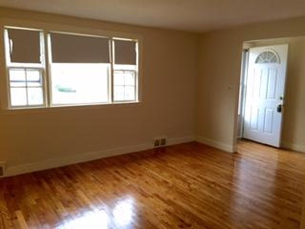 8 Leonard Road Sharon, MA 02067 - Photo 4 of 12 an empty room with a window
