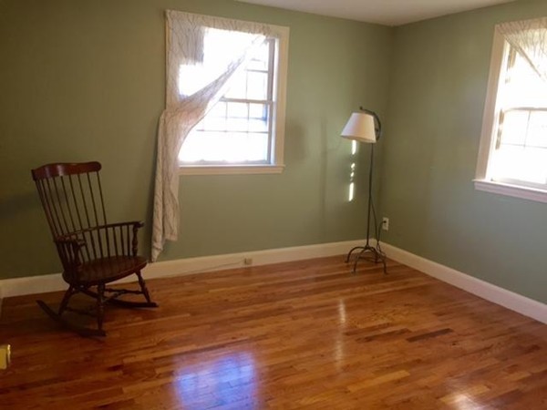 8 Leonard Road Sharon, MA 02067 - Photo 6 of 12 a view of wooden floor and windows in a room
