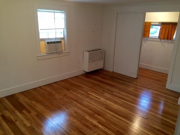 8 Leonard Road Sharon, MA 02067 - Photo 7 of 12 wooden floor in an empty room