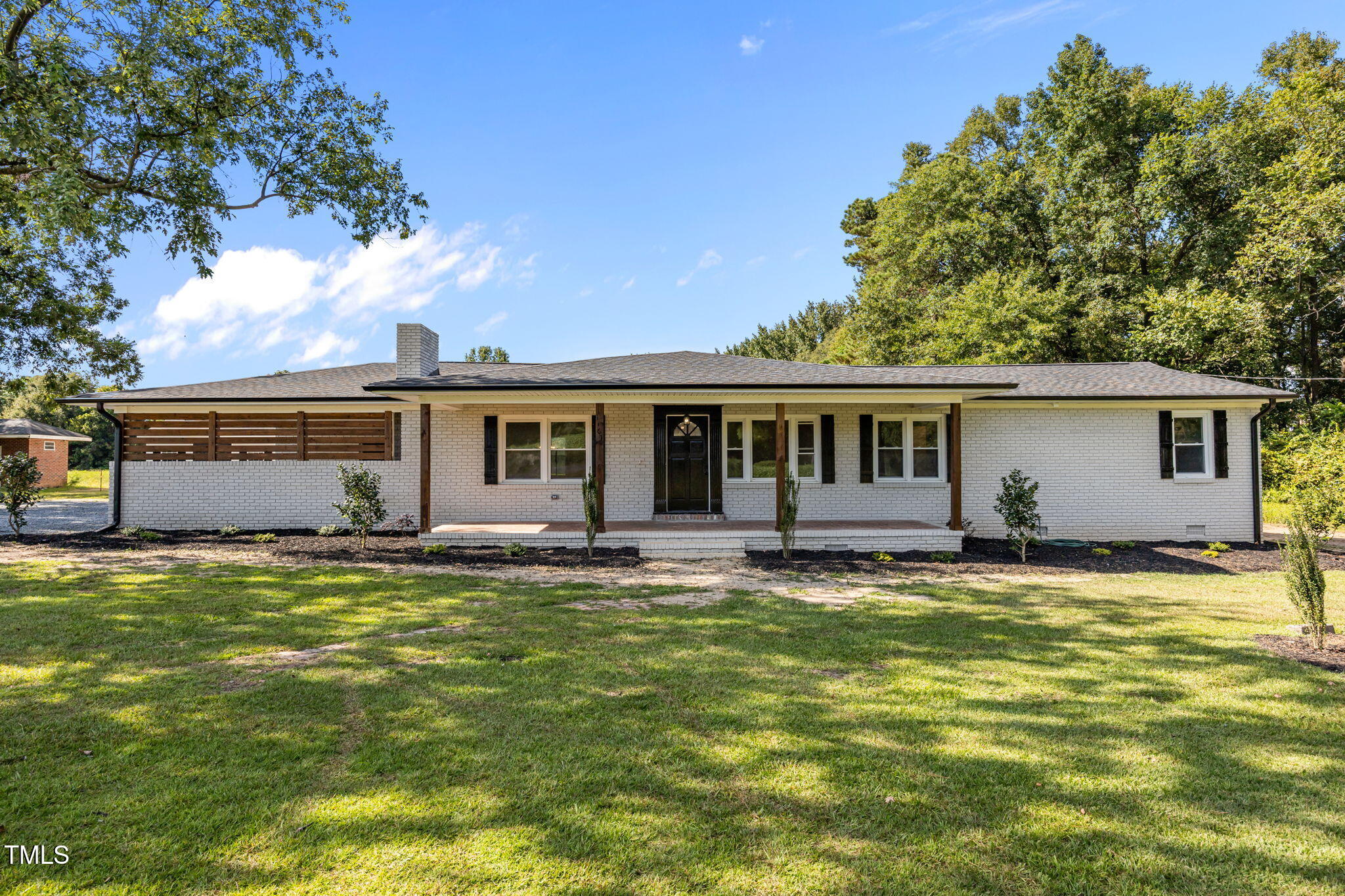 a view of a house with a swimming pool