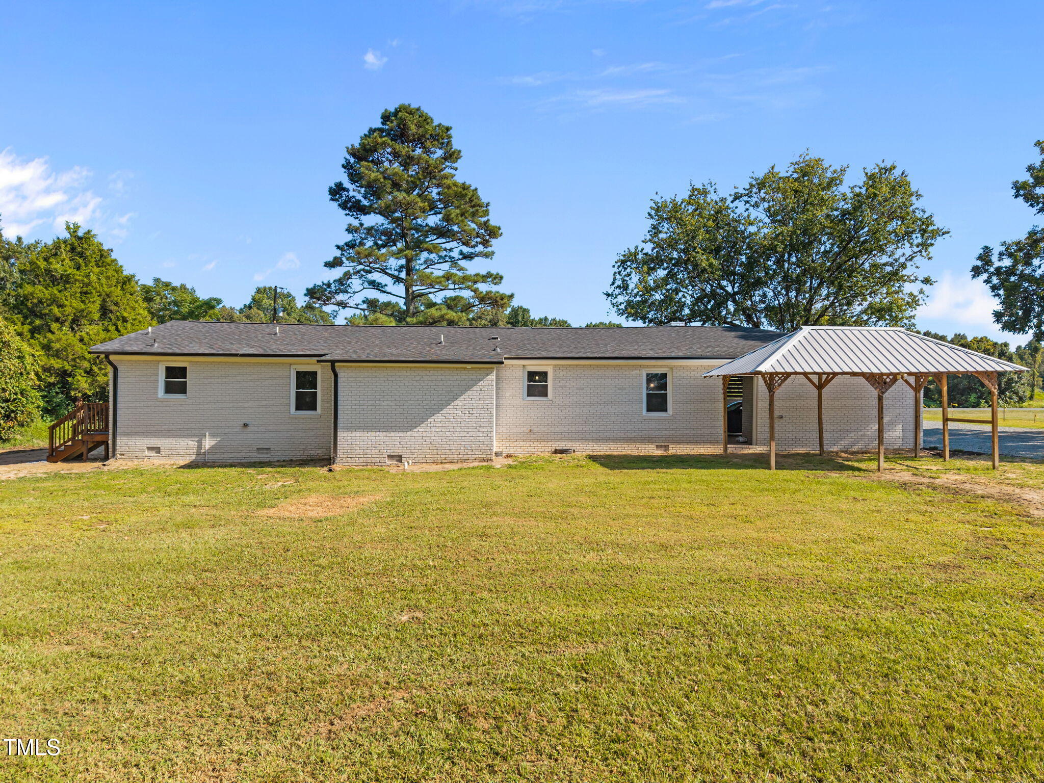 1161 Stewart Road Dunn, NC 28334 - Photo 11 of 50 a front view of house with yard and seating area