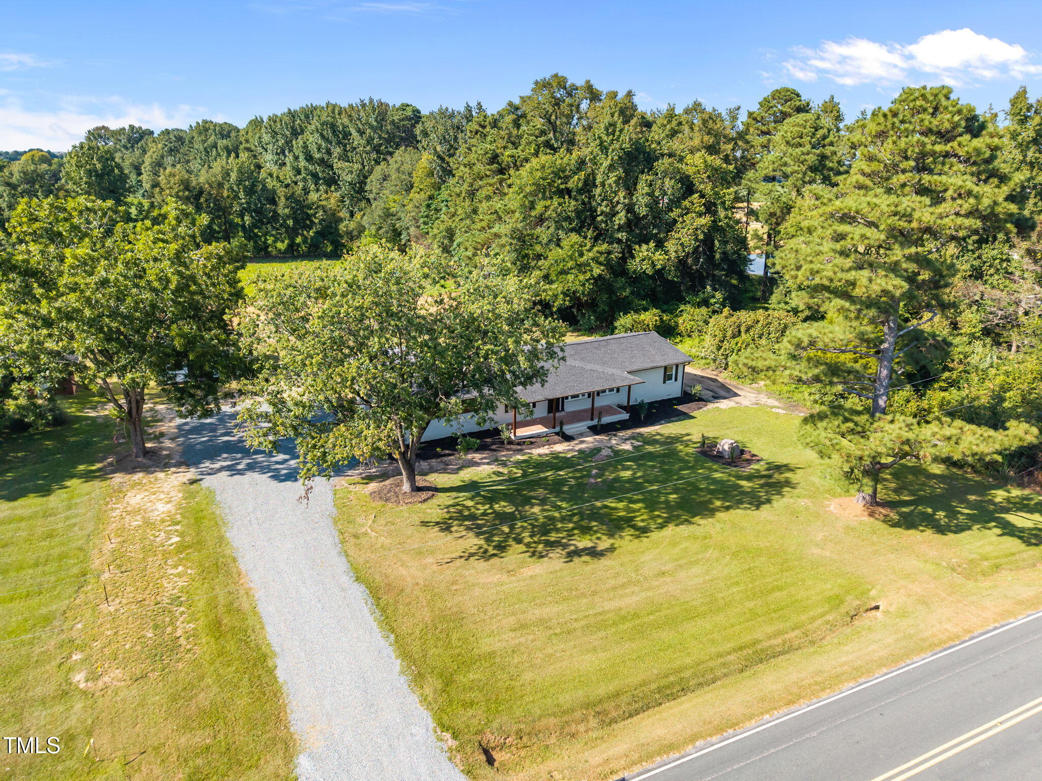 1161 Stewart Road Dunn, NC 28334 - Photo 13 of 50 a view of a yard with an outdoor space