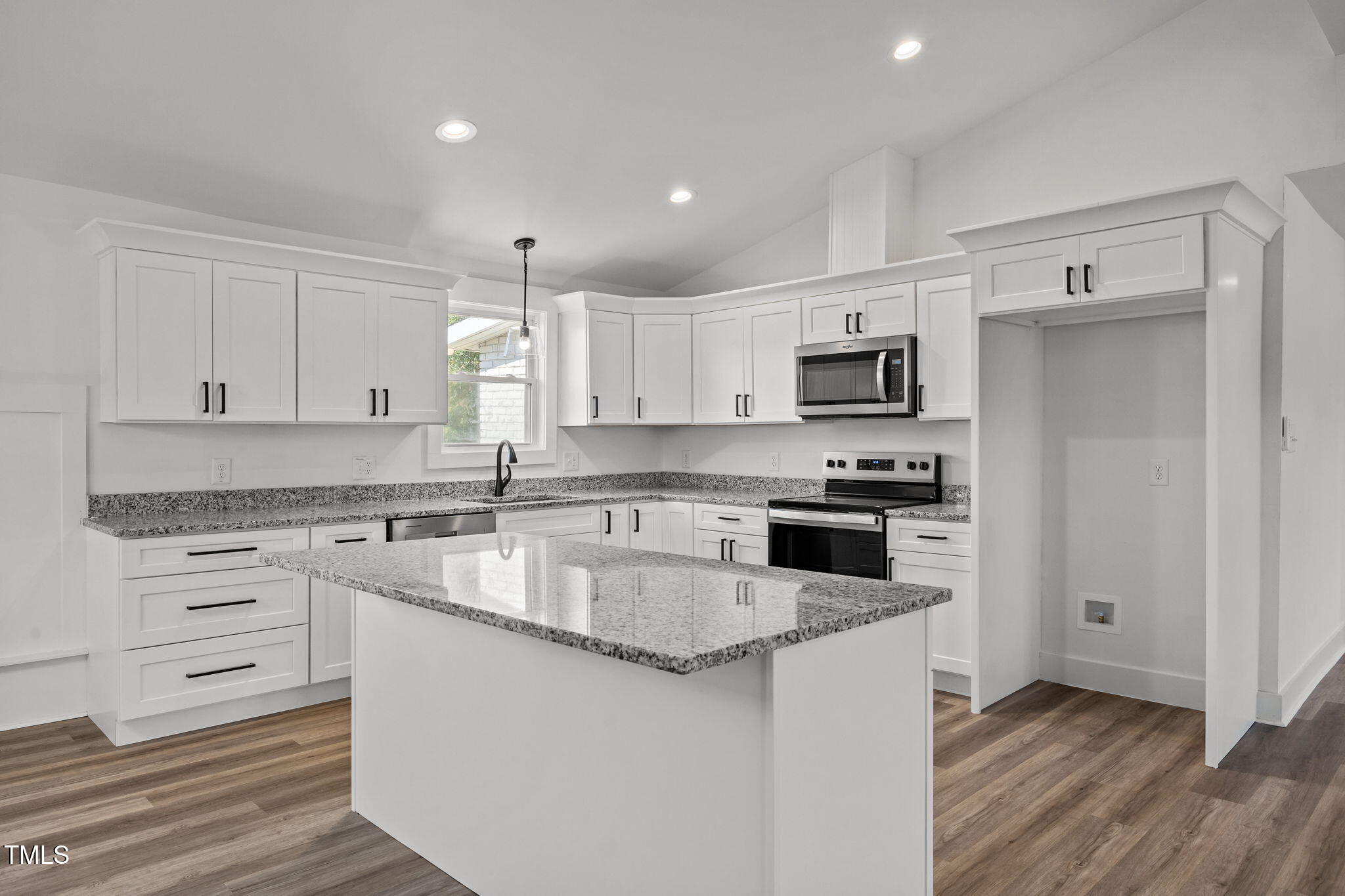 1161 Stewart Road Dunn, NC 28334 - Photo 14 of 50 a kitchen with granite countertop white cabinets and stainless steel appliances