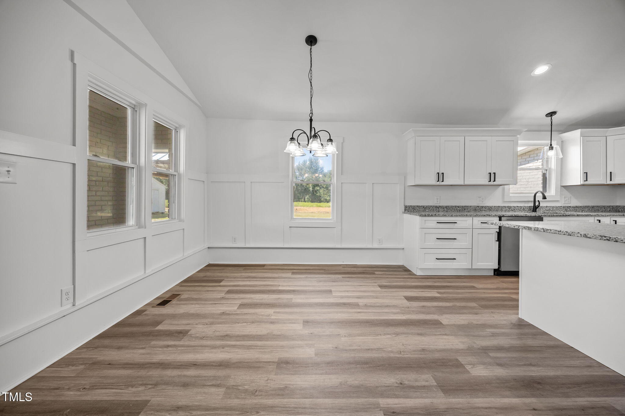 1161 Stewart Road Dunn, NC 28334 - Photo 19 of 50 a view of a kitchen with microwave and cabinets