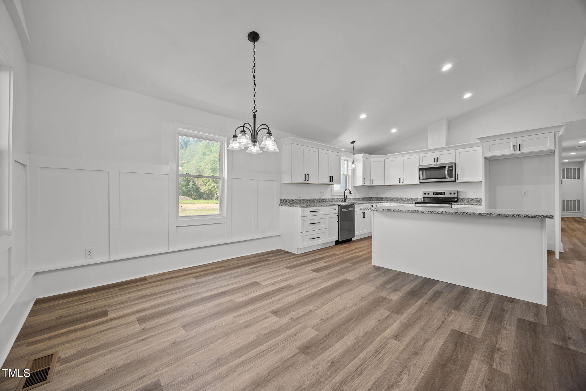1161 Stewart Road Dunn, NC 28334 - Photo 20 of 50 a view of kitchen with granite countertop cabinets and refrigerator