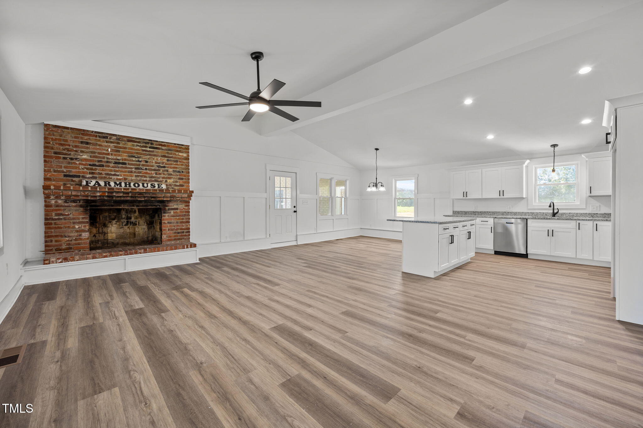 1161 Stewart Road Dunn, NC 28334 - Photo 24 of 50 a view of kitchen and kitchen with wooden floor a fireplace
