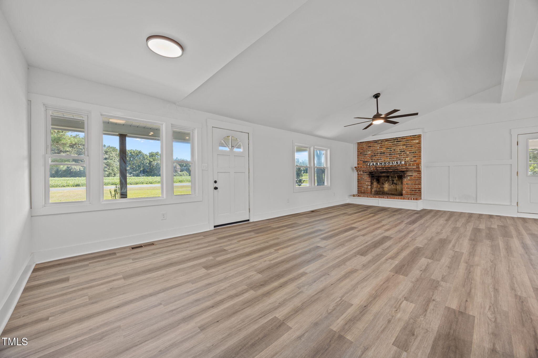 1161 Stewart Road Dunn, NC 28334 - Photo 25 of 50 an empty room with window and fireplace