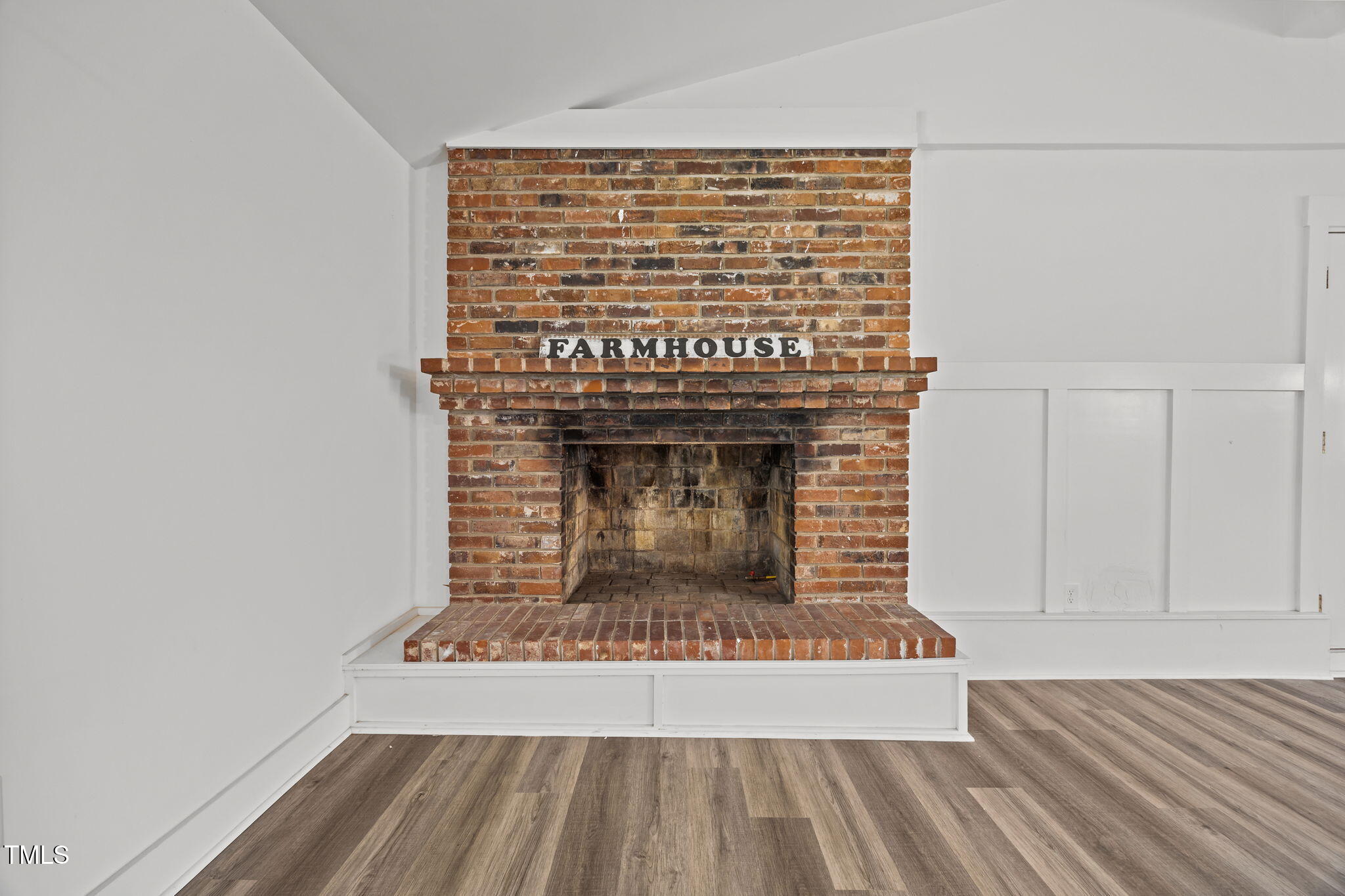 1161 Stewart Road Dunn, NC 28334 - Photo 28 of 50 a view of a fireplace with wooden floor