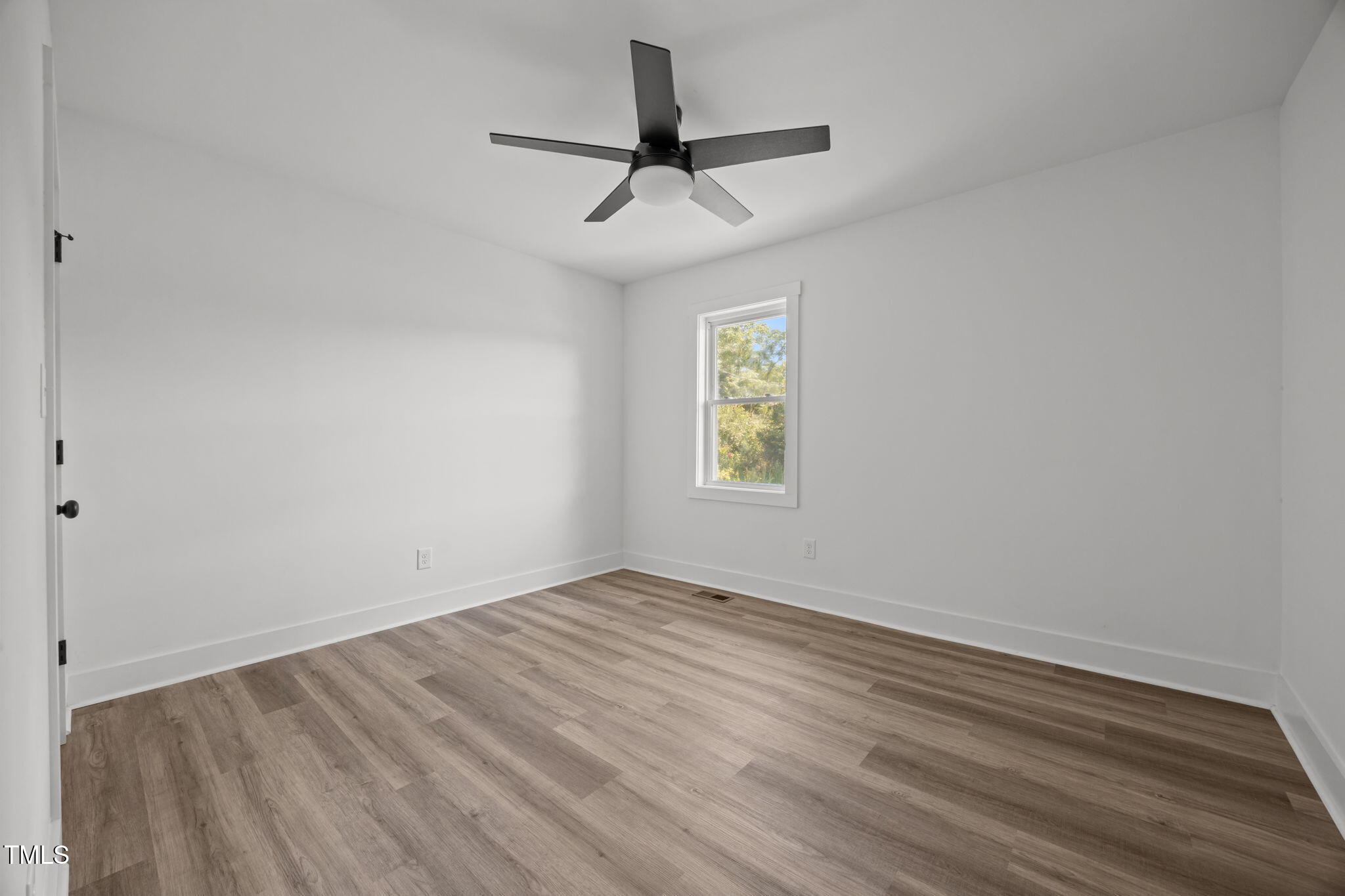 1161 Stewart Road Dunn, NC 28334 - Photo 30 of 50 wooden floor in an empty room