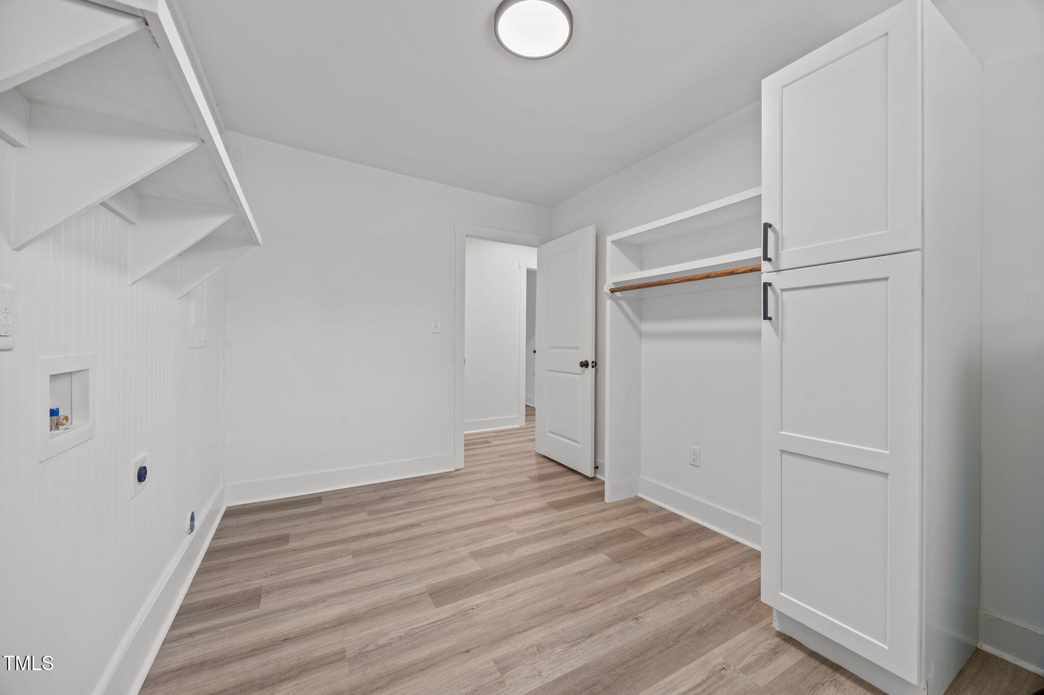 1161 Stewart Road Dunn, NC 28334 - Photo 31 of 50 a view of empty room with wooden floor