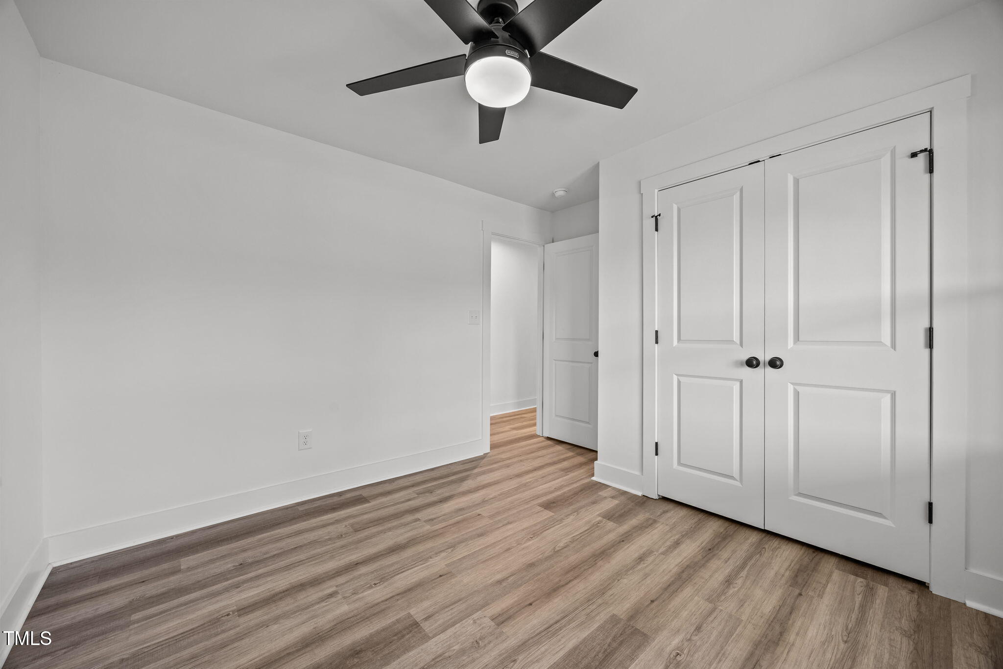 1161 Stewart Road Dunn, NC 28334 - Photo 34 of 50 a view of empty room with wooden floor