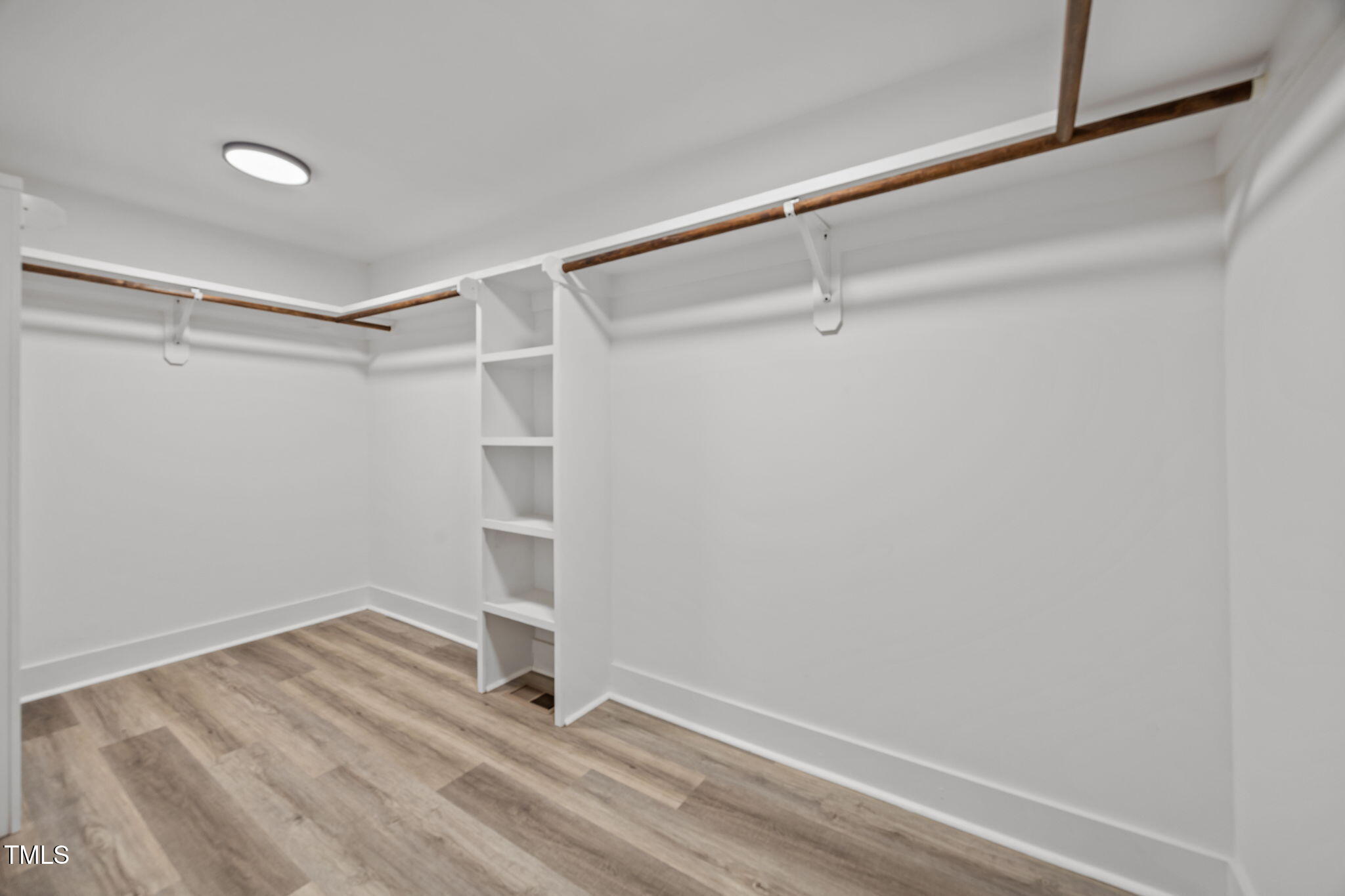 1161 Stewart Road Dunn, NC 28334 - Photo 38 of 50 a view of an empty walk in closet