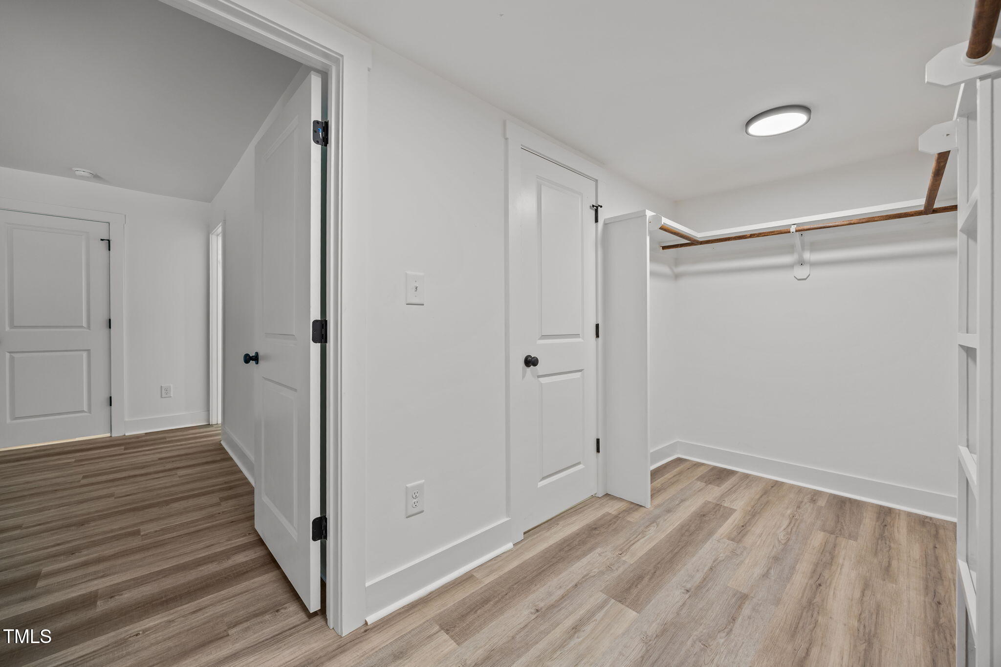 1161 Stewart Road Dunn, NC 28334 - Photo 39 of 50 a view of a room with wooden floor