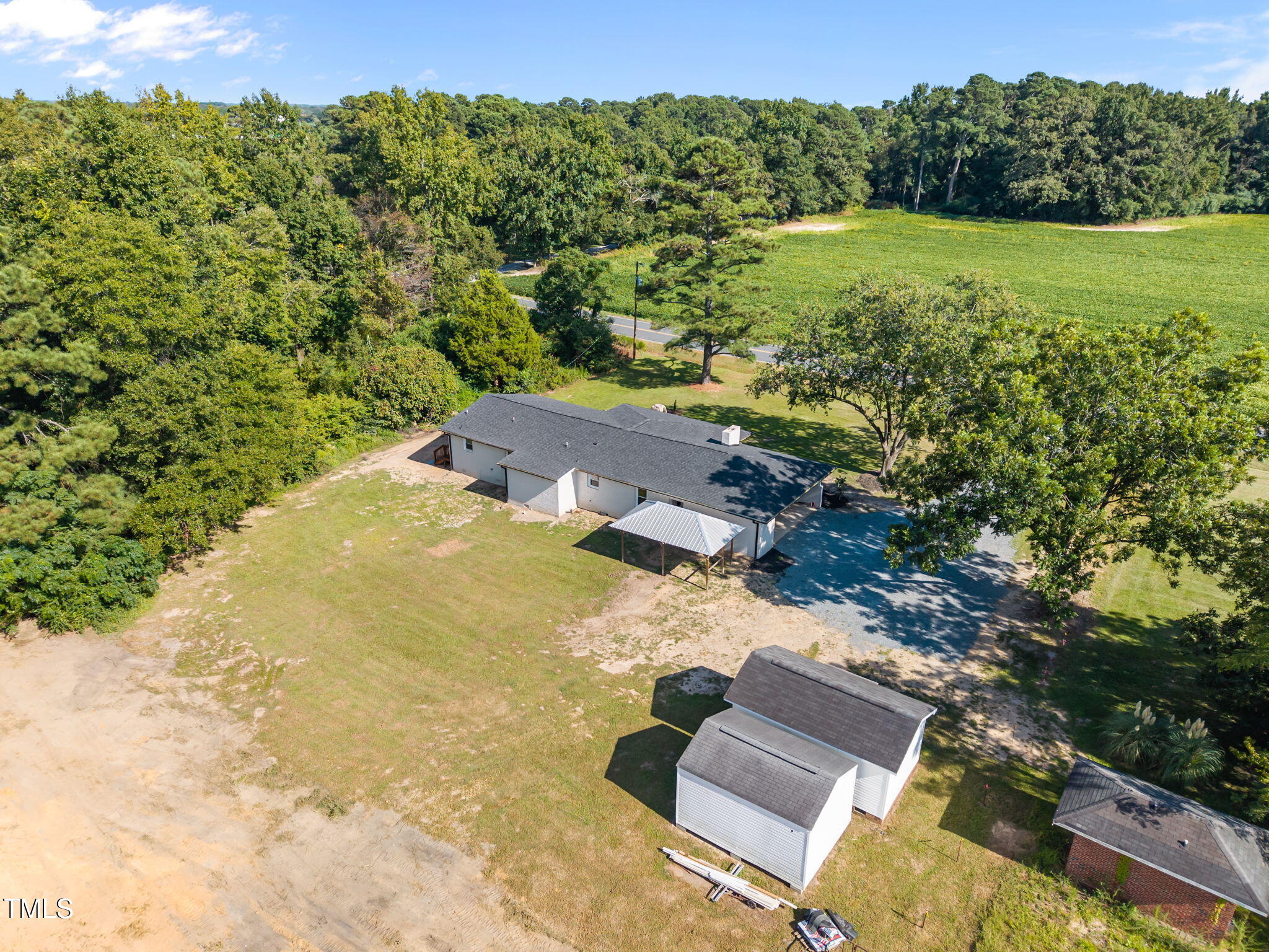 1161 Stewart Road Dunn, NC 28334 - Photo 8 of 50 an aerial view of a house with a yard