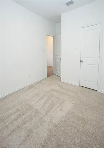 an empty room with an entryway