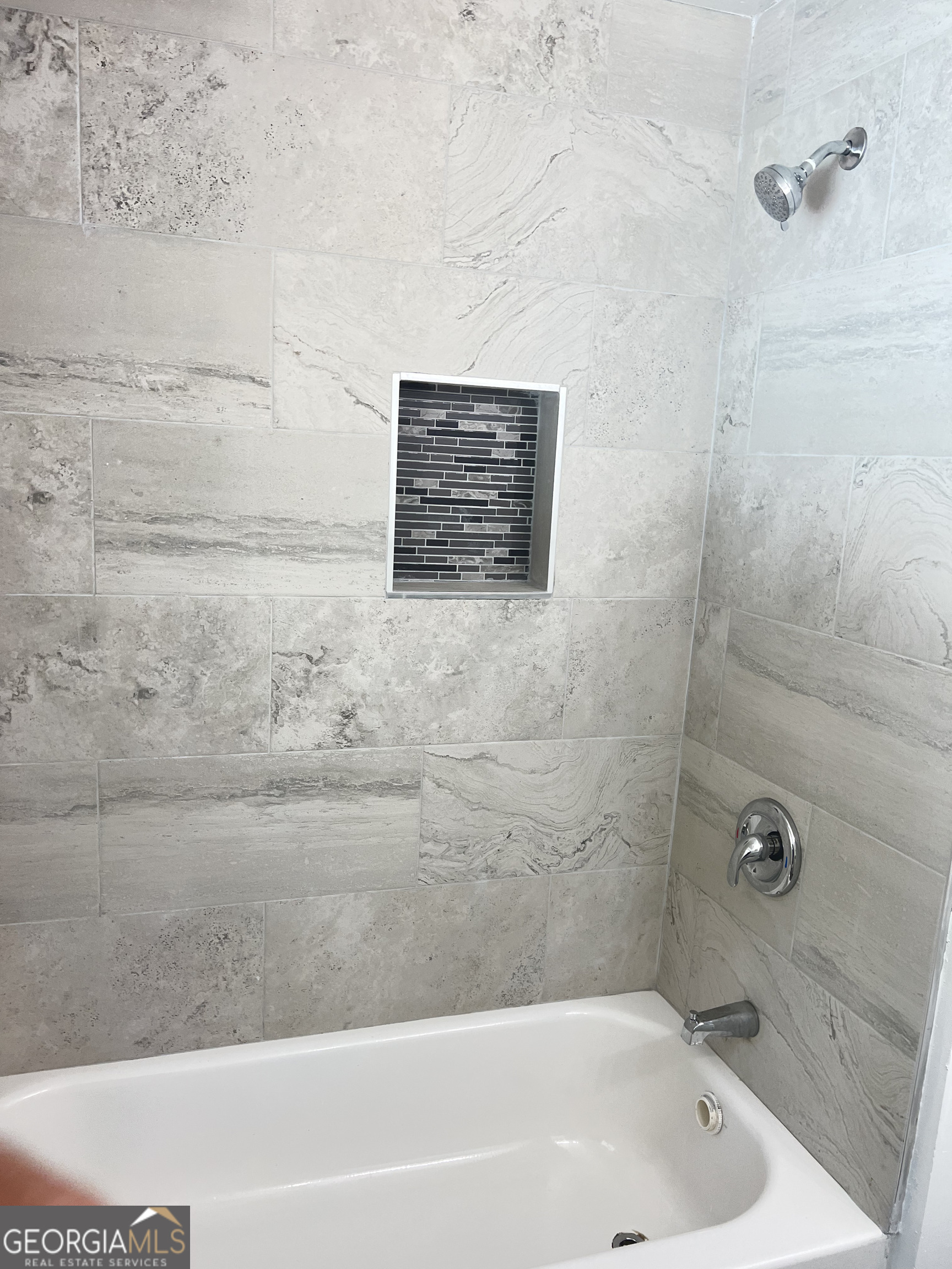 1255 Pine Avenue, Unit 2 East Point, GA 30344 - Photo 6 of 12 a bathroom with a bathtub
