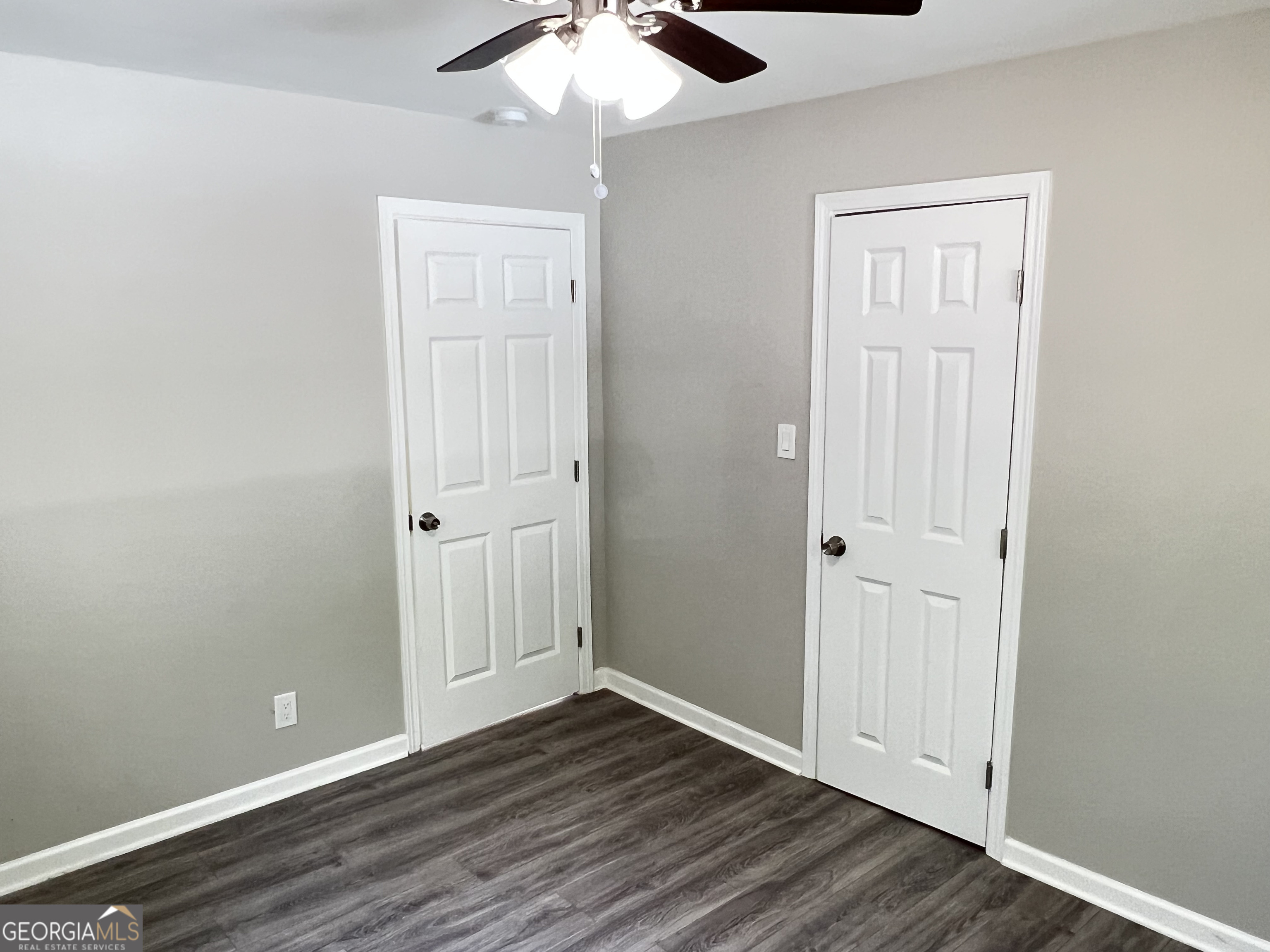 1255 Pine Avenue, Unit 2 East Point, GA 30344 - Photo 9 of 12 a view of an empty room with wooden floor