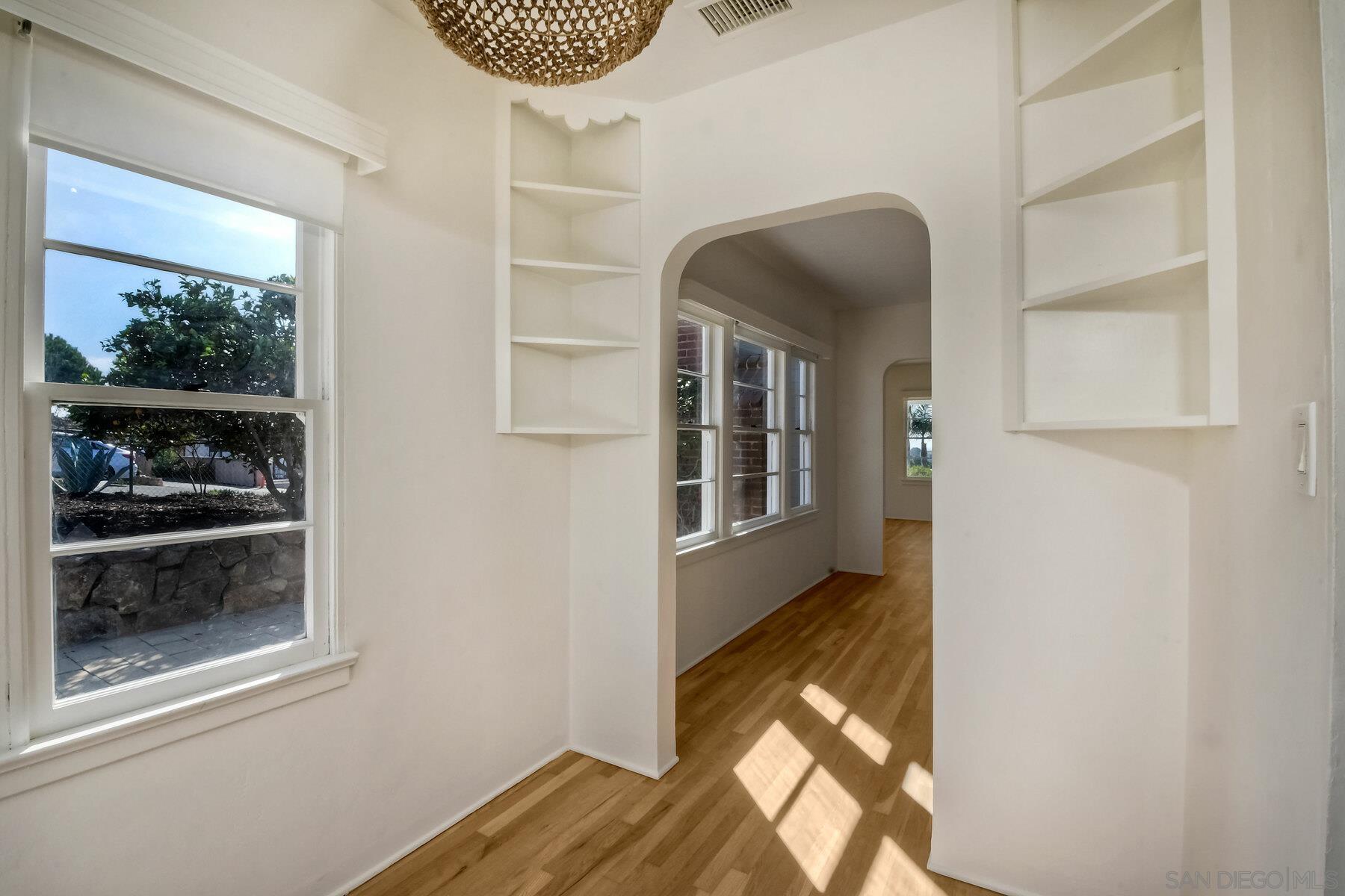 855 Dewitt Avenue Encinitas, CA 92024 - Photo 15 of 23 a view of entryway and hall with wooden floor