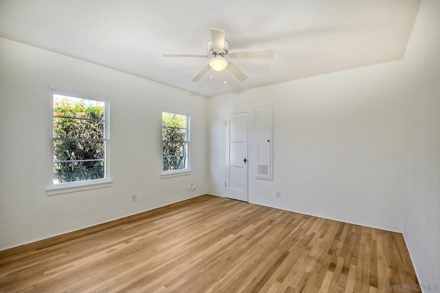 855 Dewitt Avenue Encinitas, CA 92024 - Photo 17 of 23 wooden floor in an empty room with a window