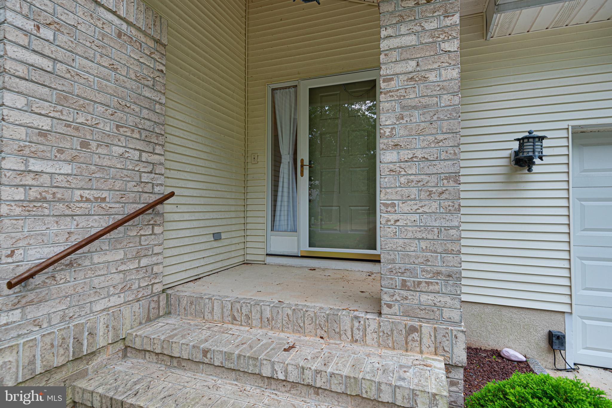 21 Beaconhill Road Ocean Pines, MD 21811 - Photo 3 of 40 Covered Brick Patio