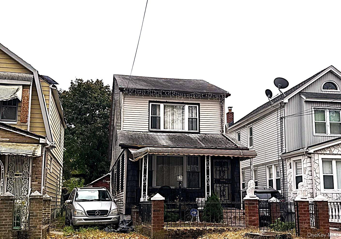 a front view of a house with street
